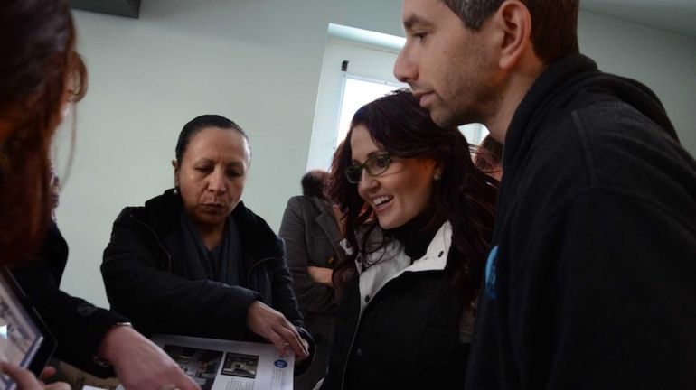 Kimberly and Sean Pastuch, who have lived in a first-floor...