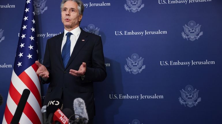 U.S. Secretary of State Antony Blinken speaks to media at...