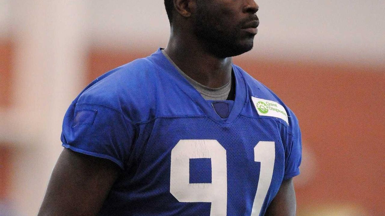 Justin Tuck's 'tight back' has Giants concerned