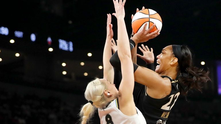 Las Vegas Aces forward A'ja Wilson (22) takes a shot...