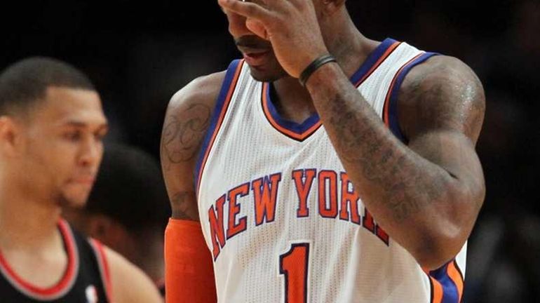 The Knicks' Amar'e Stoudemire reacts during Saturday's loss to the...