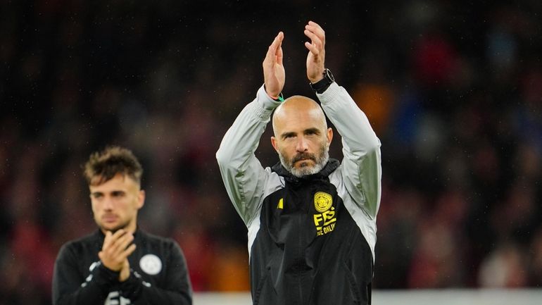 Leicester's head coach Enzo Maresca applauds fans at the end...