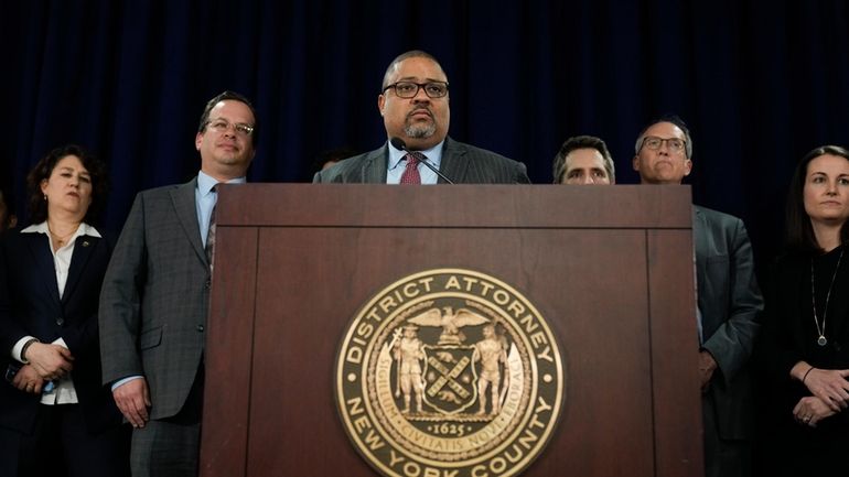 Manhattan District Attorney Alvin Bragg speaks to the media after...