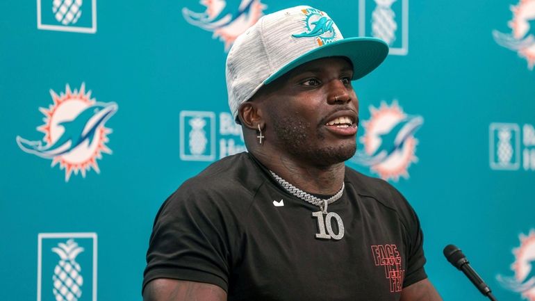 New Dolphins wide receiver Tyreek Hill holds his first news conference...