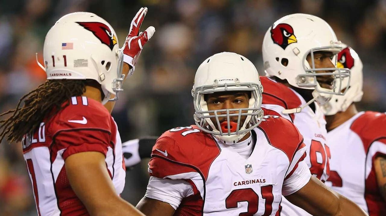 Arizona Cardinals running back David Johnson heads to the end zone with a  fifty-five yard reception for a touchdown in the fourth quarter the  Cardinals-New Orleans Saints game at University of Phoenix