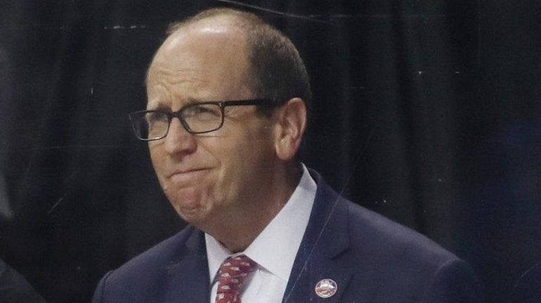 New York Islanders owner Jon Ledecky stands at attention during...