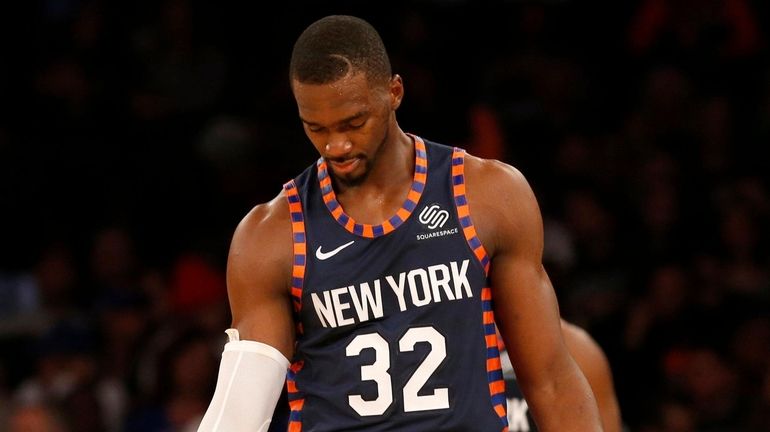 Noah Vonleh of the Knicks looks on during the first half...