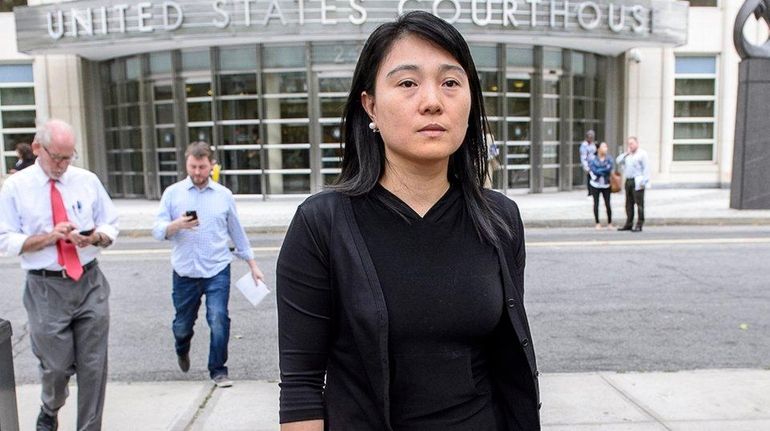 Ying Lin, of Flushing, Queens, leaves court Tuesday , Sept....