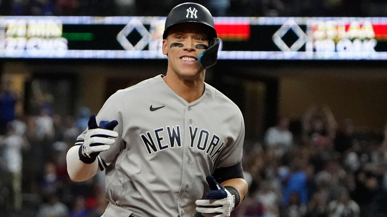 Aaron Judge of the New York Yankees rounds the bases after hitting