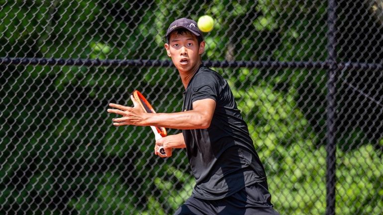 Edward Liao of Commack during the Suffolk boys tennis large...