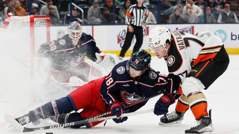 Anaheim Ducks' Frank Vatrano, right, and Columbus Blue Jackets' Damon...