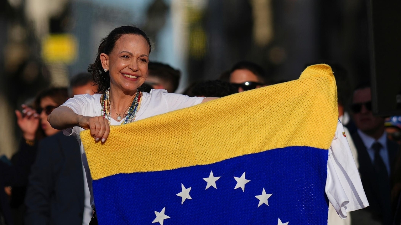 Venezuela's Maria Corina Machado draws a huge Madrid crowd and rebuffs meeting with Spain's PM