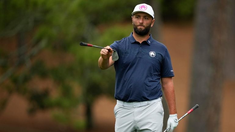 Jon Rahm, of Spain, walks to the 10th green during...