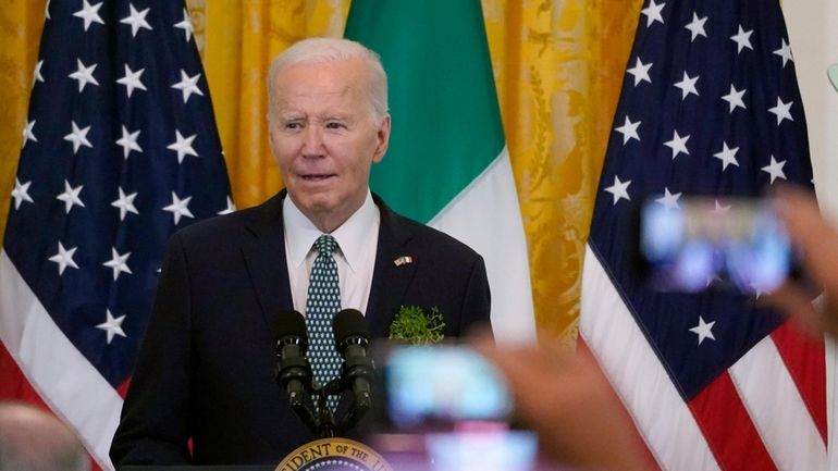 President Joe Biden speaks during a St. Patrick's Day reception...