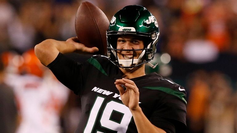 Trevor Siemian of the Jets warms up before a game against...