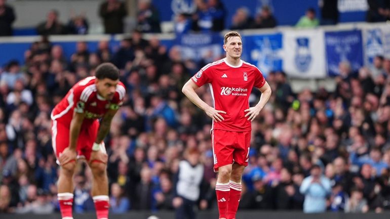 Nottingham Forest's Chris Wood and Nottingham Forest's Morgan Gibbs-White, left,...