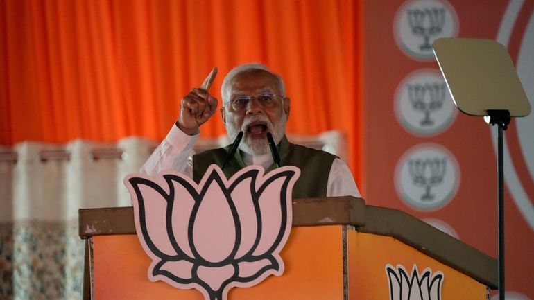 Indian Prime Minister Narendra Modi addresses an election rally in...