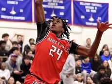 Dickerson lifts Amityville to quarterfinal victory over Bellport