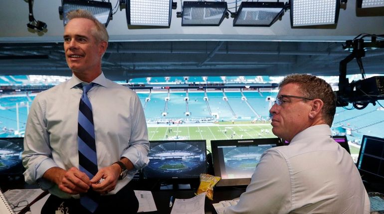  Fox Sports play-by-play announcer Joe Buck, left, and analyst Troy...