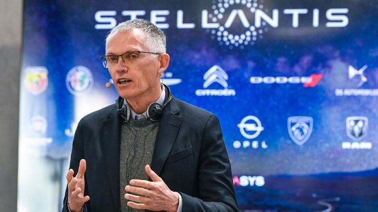 Stellantis CEO Carlos Tavares speaks during a news conference following...