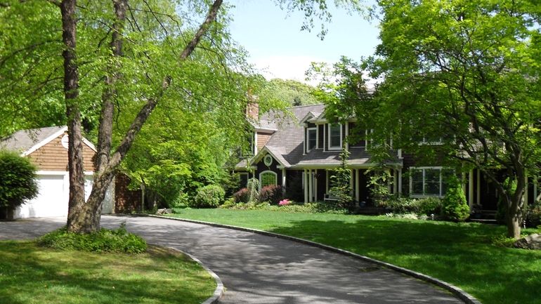 The waterfront Old Field house belonging to pop star Britney...