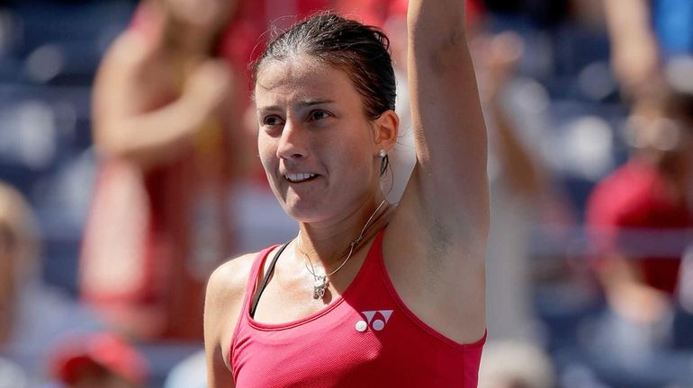 Anastasija Sevastova of Lativa celebrates her win over Johanna Konta...