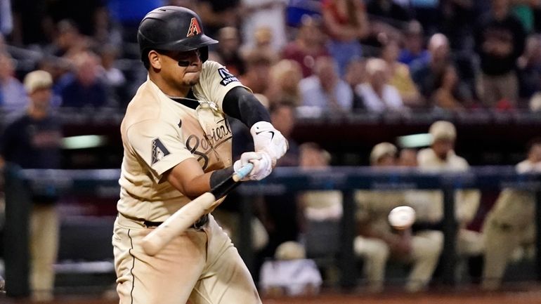 Arizona Diamondbacks' Gabriel Moreno connects for a game-winning single against...