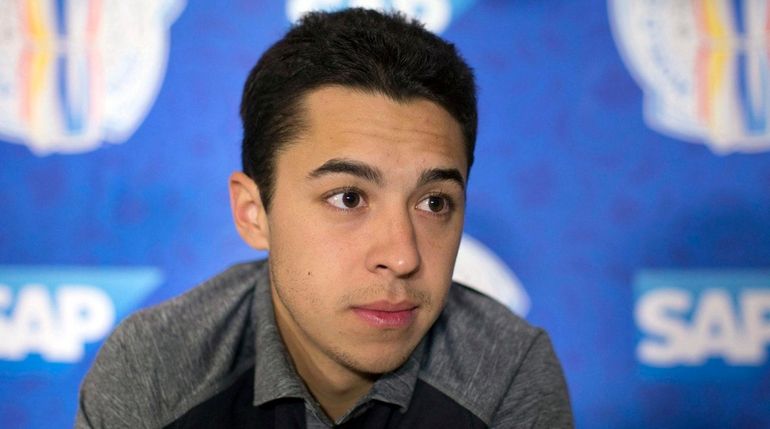 North America's Johnny Gaudreau listens during a media availability at...