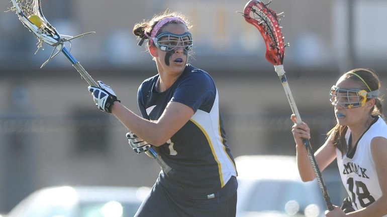 West Babylon High School senior #1 Alyssa Murray, left, looks...