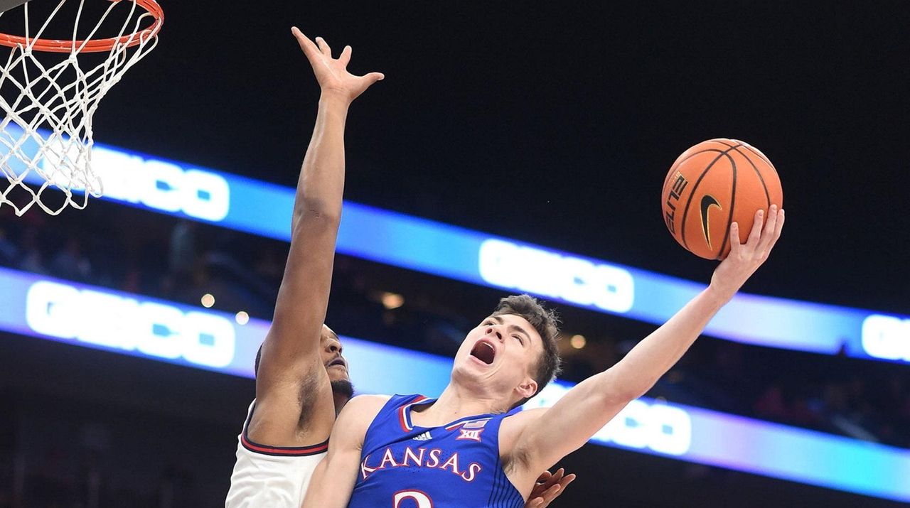 Teammates for life, Kansas' Ochai Agbaji, Christian Braun taken 7