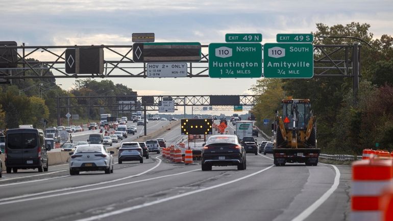 Concrete barriers split the Long Island Expressway between Exits 48 and...