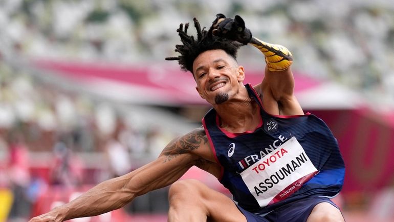 France's Arnaud Assoumani competes in the men's T47 long jump...