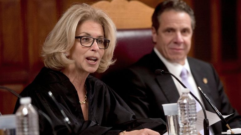 Chief Judge Janet DiFiore, left, speaks at the Court of...