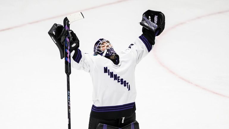 Minnesota's Nicole Hensley (29) celebrates after the team's win over...