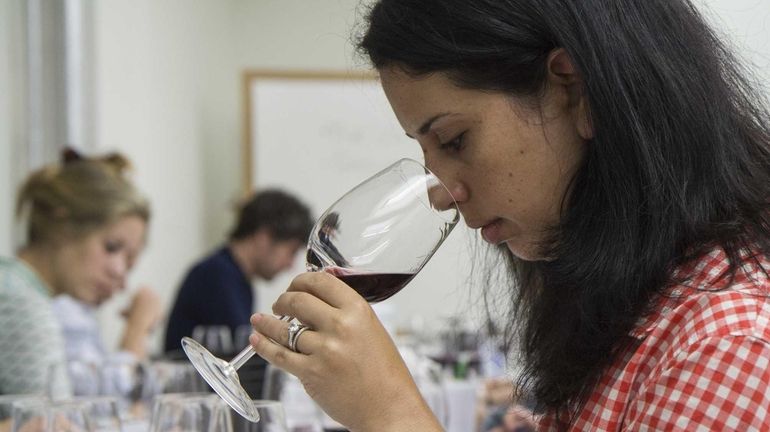 A participant in the International Wine Center's WSET Diploma class...