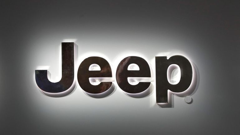 A Jeep logo is displayed at the North American International...