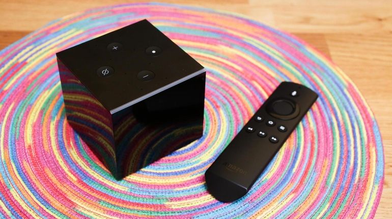 The Amazon Fire TV Cube is a mashup of universal remote control,...