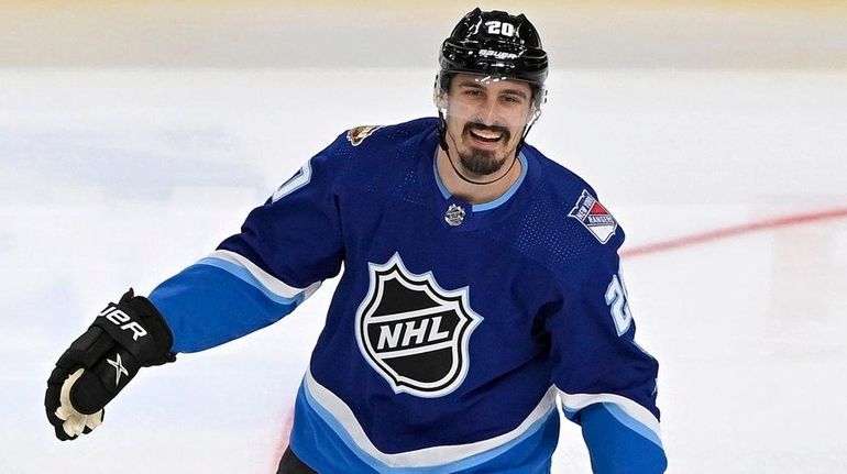 Chris Kreider of the Rangers reacts during the game between...