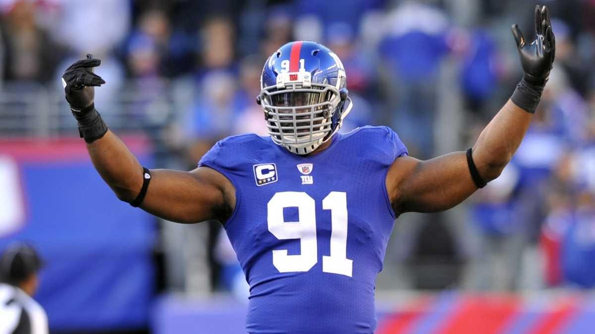 New York Giants defensive end Justin Tuck (91) celebrates his defense  causing a turnover during second half week 12 NFL action between the New  York Giants and Jacksonville Jaguars at New Meadowlands