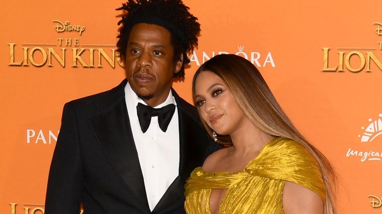 Beyoncé and Jay-Z attend the European premiere of Disney's "The Lion...