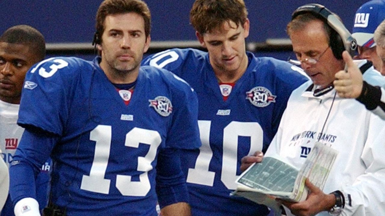 New York Giants quarterback Kurt Warner looks dejected while