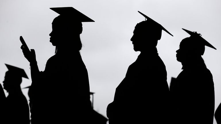 New graduates line up before the start of the Bergen...