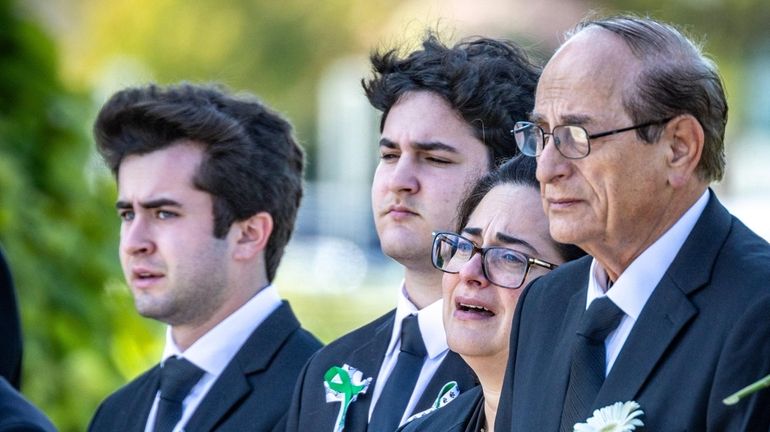 Family members of Beatrice Ferrari including her husband, Renato, at...