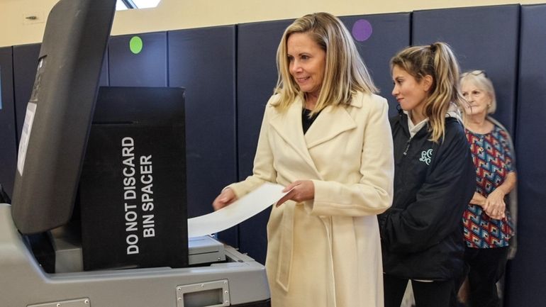 Democrat Laura Gillen, shown voting in Rockville Centre Tuesday, on...