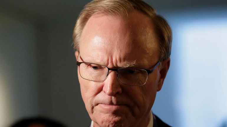 Giants owner John Mara speaks to reporters during NFL meetings...