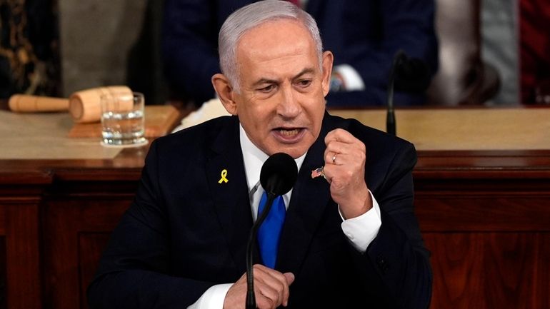 Israeli Prime Minister Benjamin Netanyahu speaks to a joint meeting...