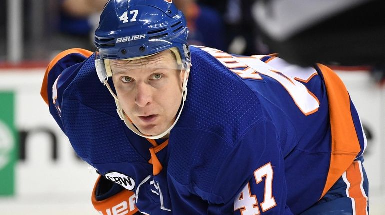 New York Islanders center Leo Komarov looks on during a...