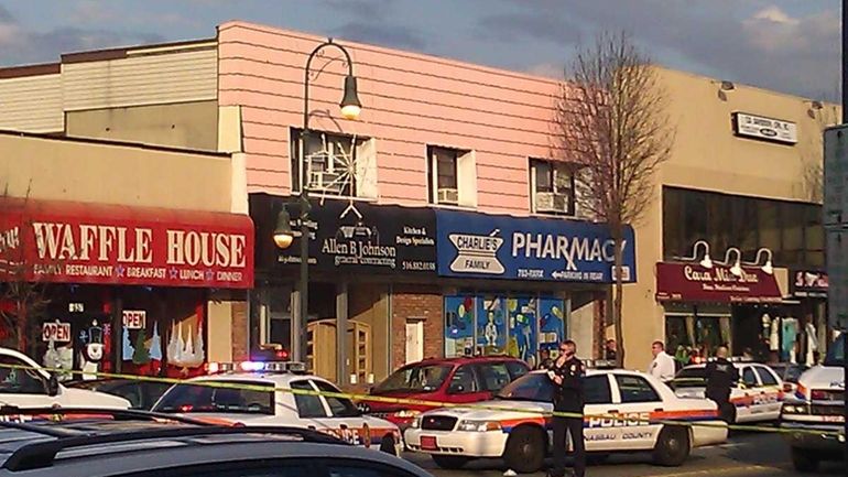 Nassau County police respond to the scene of a shooting...