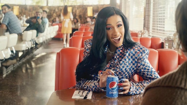 Cardi B appears in a Pepsi Super Bowl ad.