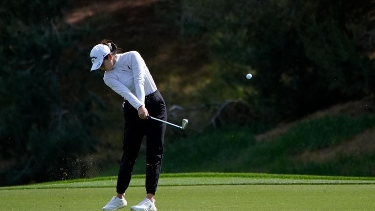 Rose Zhang hits from the ninth fairway during the second...